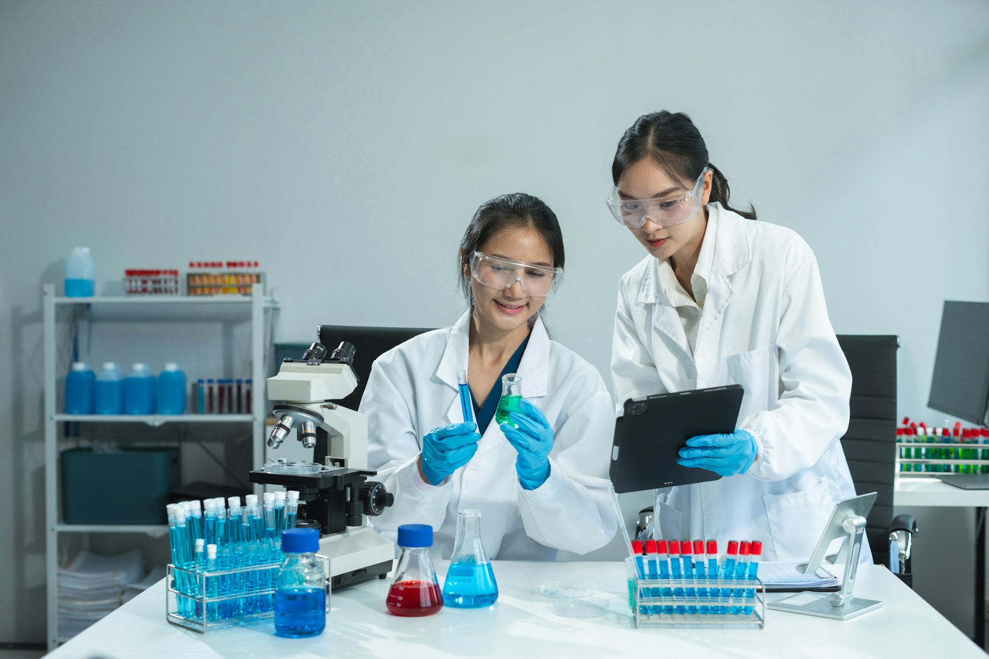 Scientist works with a pipette and a test tube. Scientific laboratory of biotechnology, development